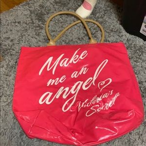 Victoria’s Secret tote bag.
